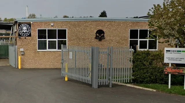 The Iron Institute building on Hollands Road, Haverhill, with its gate and car park in front