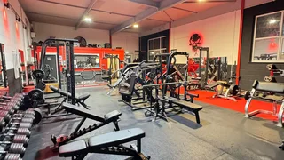 The weights floor at Iron Institute in Haverhill with nobody training and every rack and bench free